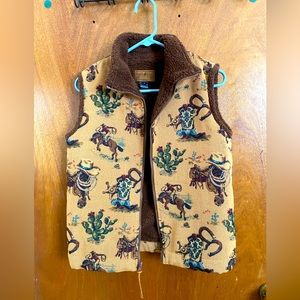 A fun vintage cowboy vest! Yeee-haw